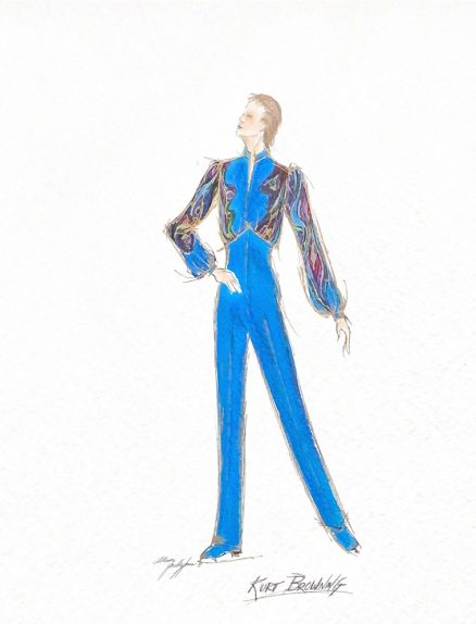 Sketch of a man standing on right leg, looking up to the left. Left leg is extended low, behind him. The fitted jumpsuit costume is royal blue with black and purple swirl designs on the full sleeves and upper body. The pant legs cover the top of his skates. “Kurt Browning” written at the bottom, along with the designer’s signature.