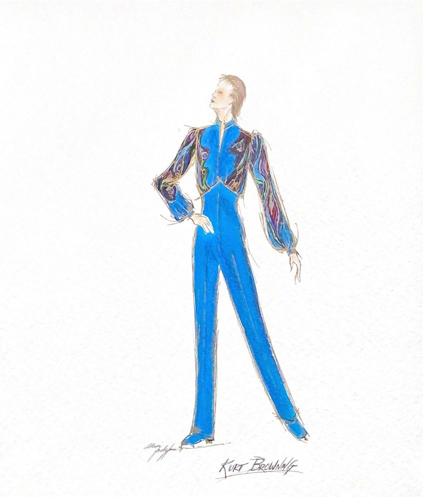 Sketch of a man standing on right leg, looking up to the left. Left leg is extended low, behind him. The fitted jumpsuit costume is royal blue with black and purple swirl designs on the full sleeves and upper body. The pant legs cover the top of his skates. “Kurt Browning” written at the bottom, along with the designer’s signature.