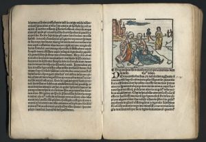 Photo of an antiquarian book, opened to show a page with text and the facing page with a colour wood print of Saint Lidwina.