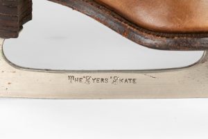 Close-up of the metal blade showing the inscription “The Syers Skate”.